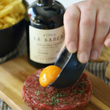 Delicious steak tartare with egg yolk and a drizzle of our amazing Smoked Olive Oil Finca La Barca!